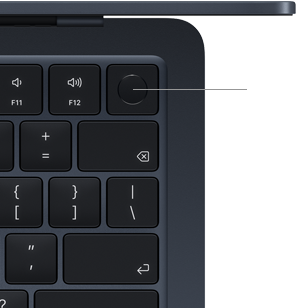 Et nærbilde av Touch ID-knappen øverst til høyre på et MacBook Air-tastatur, med en strek koblet til Touch ID-symbolet for å vise at du kan berøre knappen for å låse enheten på en sikker måte.